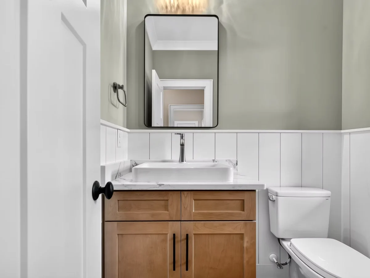 Powder room vanity with custom cabinetry